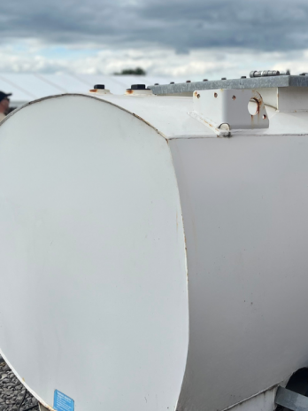 Close up of a white 950L road tow fuel bowser at a festival. The featured image for article HVO vs diesel.